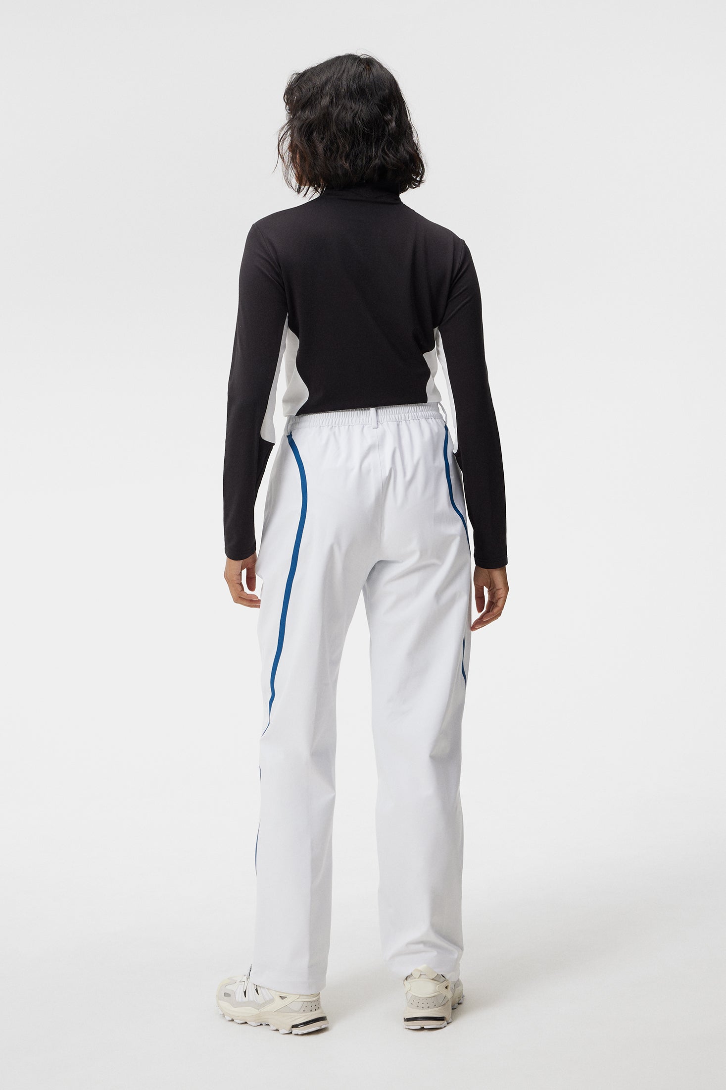 White store rain pants